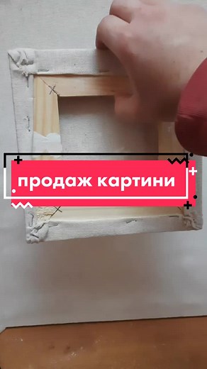 Fixing a Damaged Wooden Frame on White Surface