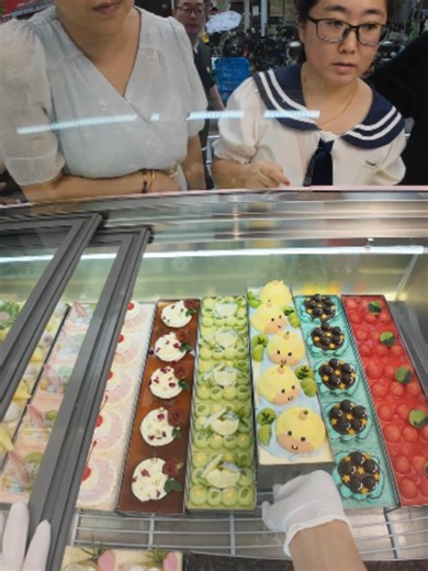 Tiramisu Cake Counter: Freshly Cut, Many Flavors