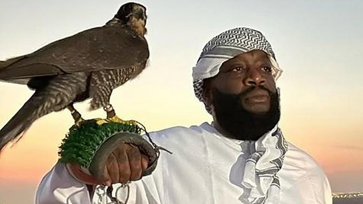 What Is The 'Rick Ross Holding An Eagle' Meme? The Viral Photograph And Its AI Edits Explained