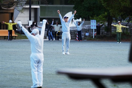 Japan awakens to Radio Taiso exercise tradition. One face of the country's longevity