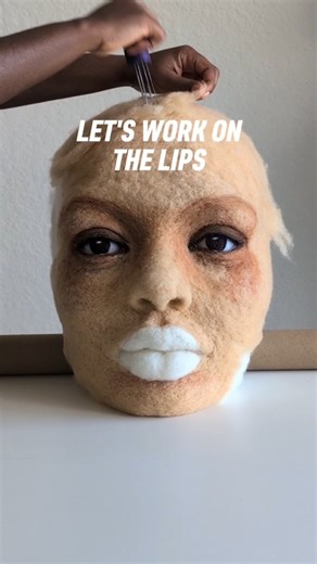 Working on the lips of this needle felted sculpture 🪡 As an artist that started off as a painter and now experimenting with fiber sculptures, I'm still learning how to "blend" and sculpt. It's not as easy as mixing the exact color I want and maintaining the 3D shape can be challenging!😅 What do you think so far? 🤔 #fiberart #contemporaryart #3Dprinting #needlefelting | Art You Hungry?