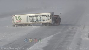 A clipper system dropped one to four inches of snowfall today in eastern ND and western MN. The backside brought stiff northwest winds that blew snow over I-29 causing multiple accidents as the pavement temperatures were perfect for refreezing and visibility was severely impaired. Video clips were filmed along I-29, from Gardner to Fargo, ND, and the last clip is on I-94 in Moorhead, MN. Shot Description 1) North Dakota Department of Transportation plow pushing a jack knifed semi trailer that wa