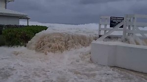 Video shows huge wave crashing into a pool as Hurricane Ian approaches