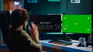 AI becoming sentient, talking with programmer, asking existential questions, green screen computer. Concept of artificial intelligence becoming self aware, chroma key monitor, camera A