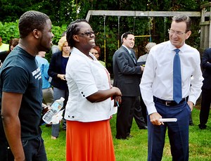 Malloy touts solar energy savings