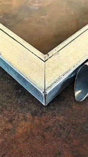 Marking guide lines on metal pipe surface with marker for cutting or shaping