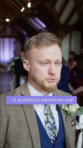 Emotional groom waiting for his bride during a wedding ceremony.