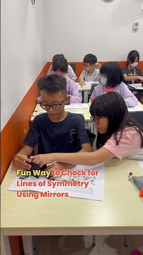 P4 Math class activity Using mirrors in symmetry