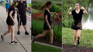 Video of lady picking up live snake with bare hands to help a man stuns many
