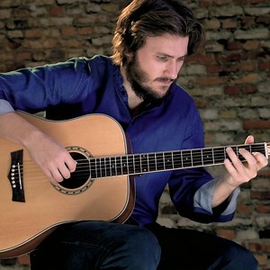 The Delta Woods™ DW-2™ offers a gorgeous spruce top with mahogany back and sides for premium tone. The solid spruce top offers incomparable resonance and sustain. Hand-carved bracing provides even tone distribution throughout the guitar's range. See more at the link below! Artist: George Pennington Music: "Wait for the Birds" See more 👉🏿 bit.ly/DW-2acoustic | Peavey Electronics