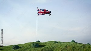 United Kingdom UK flag video waving in the wind on a beautiful landscape.