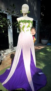 5.8M views · 272K reactions | What kind of flower do you see in this design?  Looks like a whole flower line might be blooming!  #flowerdress #fashiontrends #floraldress #dresses #dressmaking | Max Alexander | Facebook