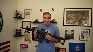 Ex-CIA officer's collection walkthrough explaining purpose and history of various displayed firearms