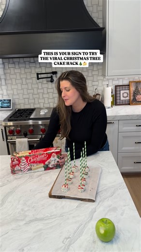 Katie Beach | Motherhood & Lifestyle on Instagram: "who doesn’t love Christmas tree cakes??? Obsessed with this quick and easy hack! #christmasrecipe #christmasdessert #christmasrecipes #easyrecipe #christmastreecakes"