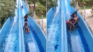 Girls in brutal wipeout after getting stuck on waterslide