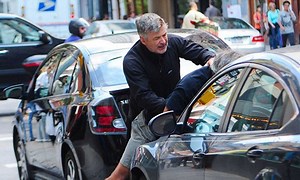 Alec Baldwin attacks paparazzo for harassing his wife and child