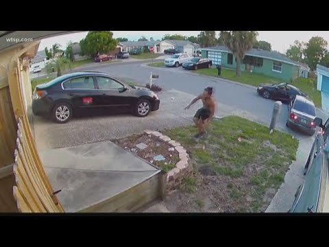 Video shows man throwing brick through a car window in road rage incident