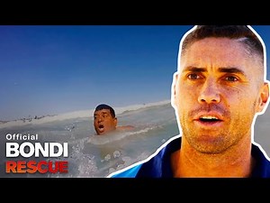 Drowning Swimmer Can't Stay On Lifeguard Rescue Board