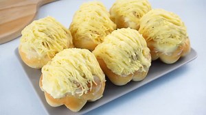 459K views · 1.9K reactions | How to make the yummiest soft and fluffy cheesy Ensaymada. Here's what you'll need: 1 large egg 1 cup warm milk (250ml) 1/4 cup sugar (50g) 1 tsp salt (5g) 3 and 1/4 cup all purpose flour (406g) 2 and 1/4 tsp instant yeast (7g) 1/3 cup unsalted butter (70g) Buttercream topping: 1/3 cup softened butter (70g) 1/3 cup icing sugar (50g) Grated cheddar cheese for toppings | Savor Easy | Facebook
