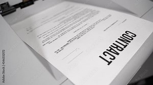 Concept: paper the contract is printed on the printer. The contract comes out of the printer. The contract sent by Fax.