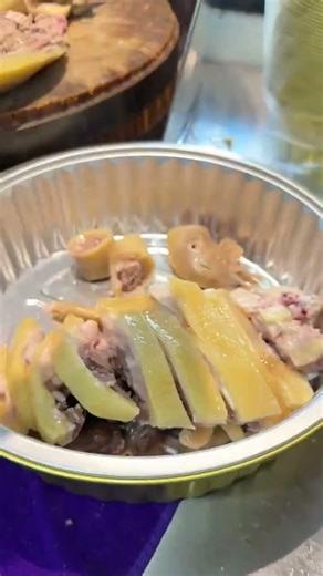 Take a bite of the crispy skinned capon and dip it in the ginger peanut oil sauce! #food #bisonmeat