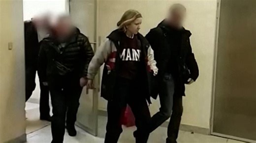 Russian investigators show woman suspected of involvement in deadly cafe blast