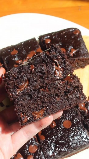 5K views · 35 reactions | ⬇️ Recipe below!  Applesauce Brownies are rich fudgy brownies made with applesauce instead of butter. They are so moist and delicious!  Recipe here - https://taffeybakery.com/applesauce-brownies/ or comment the word recipe and I’ll send it directly to your inbox! | Taffey Bakery | Facebook