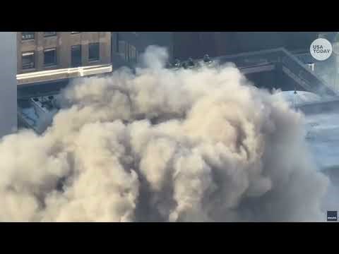 Fire in Midtown Manhattan: Smoke pours from New York City building near St. Patrick's Day parade