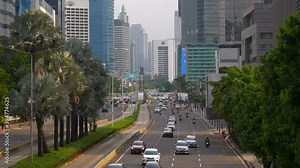 sunset time jakarta city downtown traffic street top panorama 4k indonesia