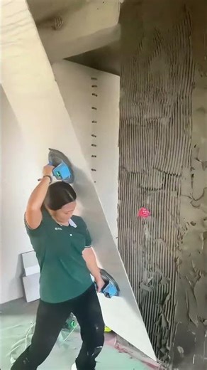 How She Efficiently Handles Large Panels with a Power Tool!