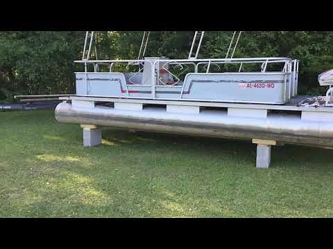 How to get pontoon boat off of trailer onto blocks part 3