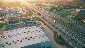 Premium stock video - Aerial view of warehouse storages or industrial factory or logistics center from above