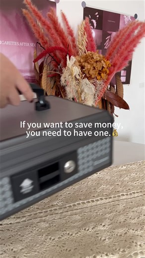 A household double-layer coin storage box, cash box, with a black surface for easy concealment, featuring a handle, lock and two keys, making it convenient to move and preventing others from easily accessing the contents inside. #safebox #storagebox #tiktokshop