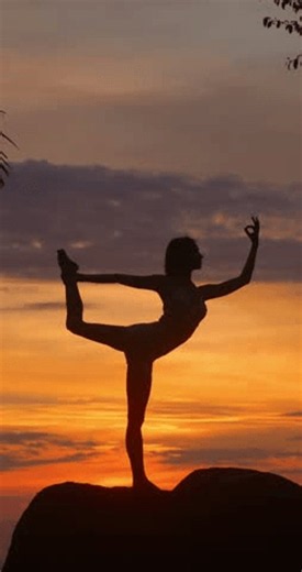 clip-4187351097-silhouette-young-woman-practicing-yoga-poses-on