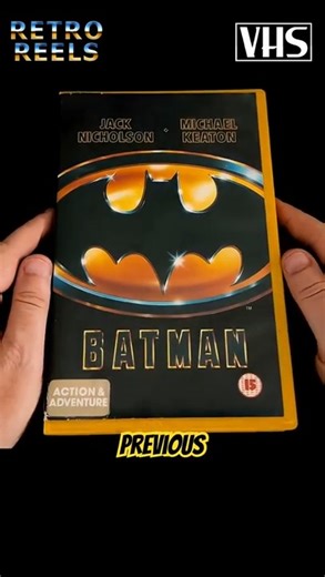 In April of 1990, Tim Burton’s Batman arrived in UK rental stores — one of the most hyped VHS releases of its time. Packaged in a striking yellow case with matching cassette spools, this iconic tape stood out on video shop shelves while doubling as a clever anti-piracy measure. Join us as we take a closer look at one of the most memorable VHS releases of the early ‘90s. #Batman1989 #VHS #PhysicalMedia #RetroReels #HomeVideoHistory #physicalmediaforever | Retro Reels