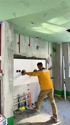 Transport it fully loaded with large ceramic tiles which will be installed on the walls of the room.