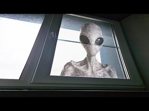 I filmed an alien on video!!!! He's in my window, not fake