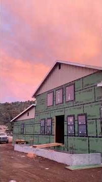 Interior framing is finished, fireplace framing has started & its time to install our entry door! #