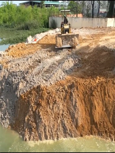 194K views · 1.8K reactions | The Ultimate Challenge: Pushing an Entire Landfill into a Lake part 01 | Bulldozer Pushing | Facebook