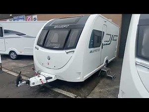 Used Swift Sprite Alpine 4 compact fixed bed caravan for sale.