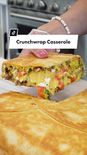 We haven't been able to pick up our jaws from how GOOD this Crunchwrap Casserole was 🤤 Cheesy, savory, hearty, where could you go wrong? The perfect easy weeknight meal that'll be added to the rotation instantly! Let @NicoleMcLaughlin show you have to make the perfect bite of this fast food favorite 🧀🥬🍅 Head to the link in bio for more on this recipe. #crunchwrapcasserole #fastfood #cheesy #hearty #easyrecipes #weeknightdinner
