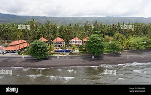 Aerial view of beautiful beach, hotel, Bali, Indonesia. Beach with black volcanic sand.Seascape ocean, sky, sea. 4K video Travel concept, Aerial footage Stock Photo - Alamy
