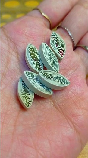 Simple yet stunning—mastering the eye-shaped #PaperFlowers #HandmadeArt #QuillingArt #CreativeCrafts