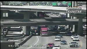 Spool on truck gets stuck under 610 West Loop at Highway 59