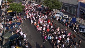 Welcoming staff and students #BackToSchool, the Cajon Valley Union School District - in conjunction with the El Cajon Police Dept, Heartland Fire & Rescue, and hundreds of community members including council members from El Cajon, California - convened a flash mob to music from the hit movie Grease at the El Cajon Car Show on Main Street, El Cajon. Celebrating the new school year and a joint community mission: Making Cajon Valley the best place to live, work, play, and raise a family. NO COPYRIG