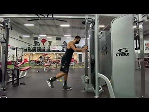 Curl femoral unilateral en polea baja con grillete