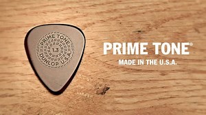 Dunlop's Primetone picks will glide off your strings and bring out the true voice and clarity of your instrument. They're made from Ultex for maximum durability and tonal definition, with hand-burnished sculpted edges for fast, articulate runs and effortless strumming. Available in a variety of shapes and gauges with a low-profile grip or a smooth traditional surface. | Jim Dunlop Guitar Products