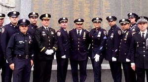 American police officers stand with French colleagues in Paris
