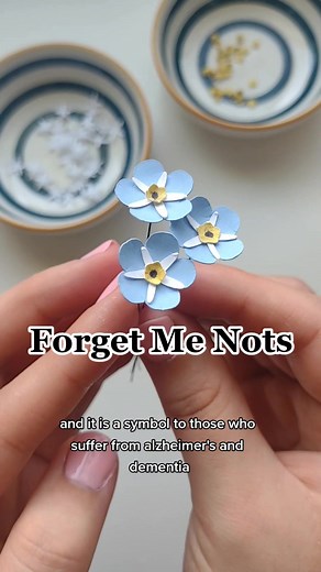 The highly requested forget me nots! Such a cute and tiny flower with so much meaning. Also that knight had a major skill issue 😂😅 These will be in my shop May 2nd! 🌿 • #forgetmenot #paperflowers #papercraft #flowers #flowermeaning #springflowers #cottagecore #artok #artistsoftiktok #shopsmall #smallbusinessowner #smallbusinesscheck
