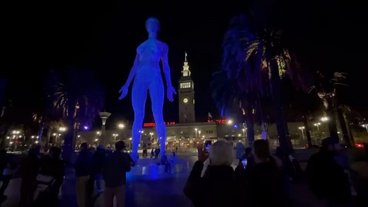 The sculpture R-Evolution by artist Marco Cochrane is illuminated with colored lights after being unveiled to the public on Thursday. 🎥: Carlos Avila Gonzalez/The Chronicle | San Francisco Chronicle